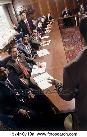 Business executives meeting in a conference room View Large Photo Image Stock Image - Business executives meeting in a conference room. Fotosearch