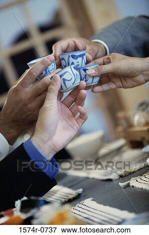 Business executives toasting with tea View Large Photo Image Stock Photo - Business executives toasting with tea. Fotosearch