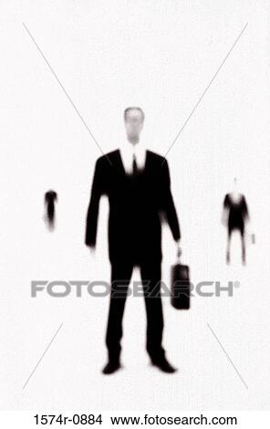 Picture - Businessman carrying a briefcase. Fotosearch