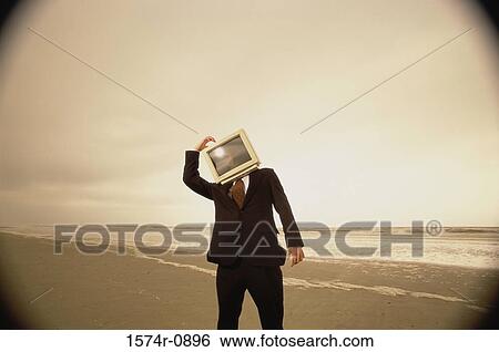 Stock Photograph - Businessman with a computer monitor for a head. Fotosearch