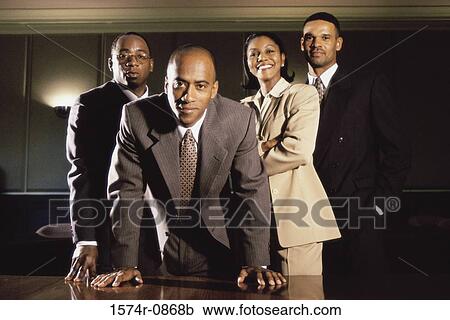 Portrait of a group of business executives in an office View Large Photo Image Stock Image - Portrait of a group of business executives in an office. Fotosearch