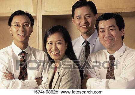 Portrait of a group of young business executives in an office View Large Photo Image Stock Image - Portrait of a group of young business executives in an office. Fotosearch