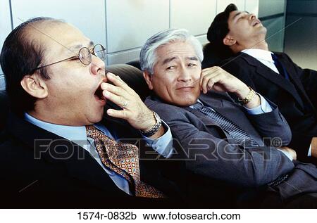 Three businessmen sitting and waiting View Large Photo Image Stock Image - Three businessmen sitting and waiting. Fotosearch