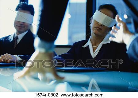 Two blindfolded business executives at a desk View Large Photo Image Stock Image - Two blindfolded business executives at a desk. Fotosearch