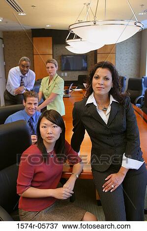 Portrait of a group of business executives in a conference room View Large Photo Image Stock Photo - Portrait of a group of business executives in a conference room. Fotosearch
