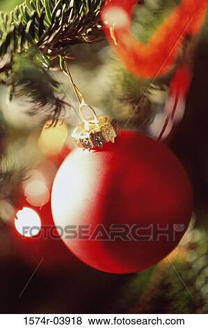 Stock Photo - Close-up of a Christmas ornament on a Christmas tree. Fotosearch