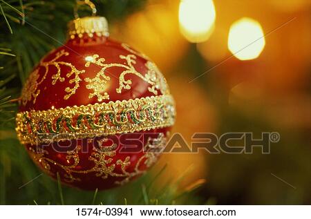 Close-up of a Christmas ornament hanging on a Christmas tree View Large Photo Image Stock Image - Close-up of a Christmas ornament hanging on a Christmas tree. Fotosearch
