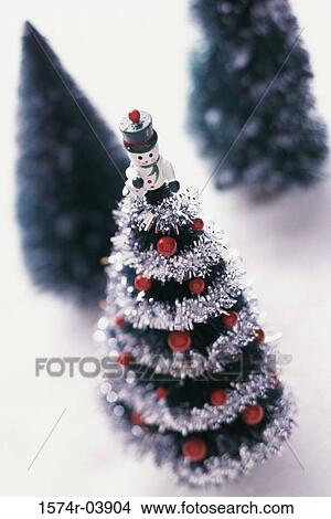 Close-up of a miniature Christmas tree View Large Photo Image Picture - Close-up of a miniature Christmas tree. Fotosearch