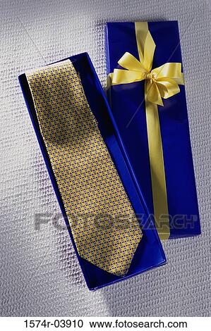 Stock Image - Close-up of a tie in a box. Fotosearch
