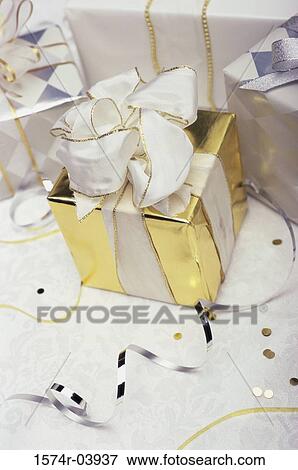 Close-up of a wrapped gift View Large Photo Image Stock Photo - Close-up of a wrapped gift. Fotosearch