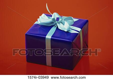 Close-up of a wrapped gift View Large Photo Image Stock Photo - Close-up of a wrapped gift. Fotosearch