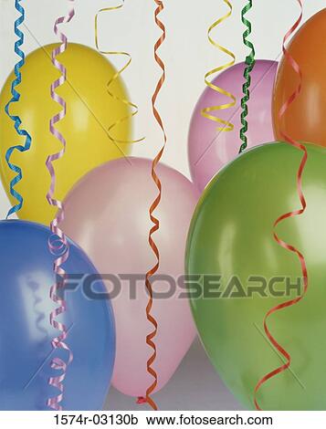 Stock Image - Close-up of balloons and streamers. Fotosearch