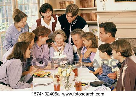 Family celebrating a birthday party View Large Photo Image Stock Image - Family celebrating a birthday party. Fotosearch