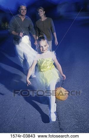 Girl trick or treating at Halloween View Large Photo Image Stock Image - Girl trick or treating at Halloween. Fotosearch