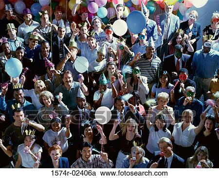 Stock Image - High angle view of a group of people at a New Year's party. Fotosearch