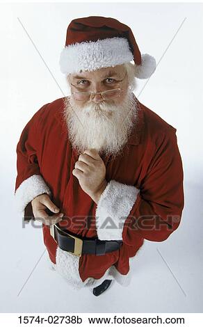 High angle view of Santa Claus looking at the camera View Large Photo Image Stock Image - High angle view of Santa Claus looking at the camera. Fotosearch