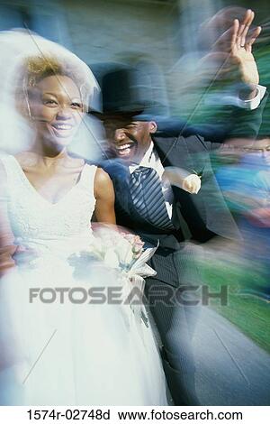 Newlywed couple running together View Large Photo Image Stock Image - Newlywed couple running together. Fotosearch