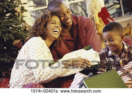 Stock Image - Parents with their son. Fotosearch