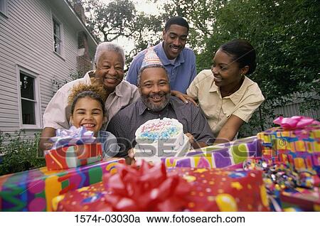 Portrait of a family at a birthday party View Large Photo Image Stock Image - Portrait of a family at a birthday party. Fotosearch