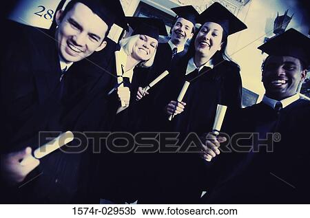 Portrait of a group of young graduates holding diplomas smiling View Large Photo Image Stock Image - Portrait of a group of young graduates holding diplomas smiling. Fotosearch