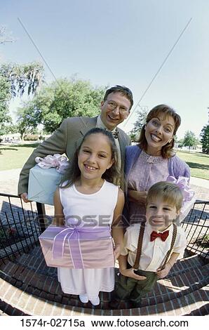 Portrait of parents with their son and daughter View Large Photo Image Stock Image - Portrait of parents with their son and daughter. Fotosearch