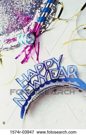 Sequined hat with a Happy New Year sign and streamers View Large Photo Image Stock Photo - Sequined hat with a Happy New Year sign and streamers. Fotosearch