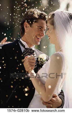 Side profile of a newlywed couple dancing View Large Photo Image Stock Image - Side profile of a newlywed couple dancing. Fotosearch
