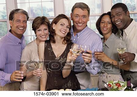 Three mature couples toasting with glasses of wine View Large Photo Image Stock Image - Three mature couples toasting with glasses of wine. Fotosearch