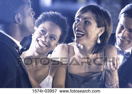 Two young couples smiling View Large Photo Image Stock Photo - Two young couples smiling. Fotosearch