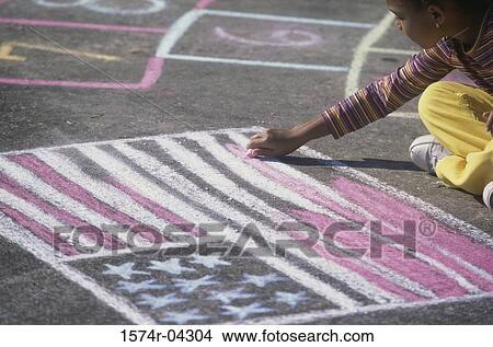 Girl drawing the American flag on the ground with chalk View Large Photo Image Picture - Girl drawing the American flag on the ground with chalk. Fotosearch