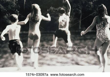 Group of children jumping into water View Large Photo Image Stock Image - Group of children jumping into water. Fotosearch
