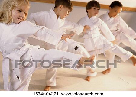 Group of children learning karate View Large Photo Image Stock Image - Group of children learning karate. Fotosearch