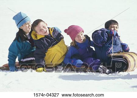 Group of children riding on a slide View Large Photo Image Stock Photo - Group of children riding on a slide. Fotosearch
