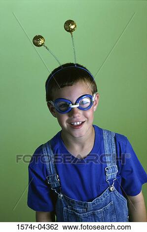 Portrait of a boy wearing antennae and swimming goggles View Large Photo Image Stock Image - Portrait of a boy wearing antennae and swimming goggles. Fotosearch