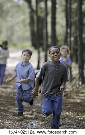 Stock Image - Two boys and a girl running. Fotosearch