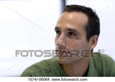Picture - Close-up of a businessman in an office. Fotosearch