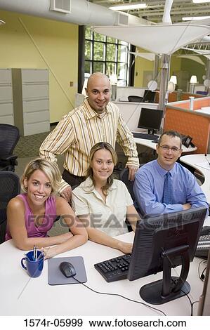 Portrait of a group of business executives in an office View Large Photo Image Stock Photo - Portrait of a group of business executives in an office. Fotosearch