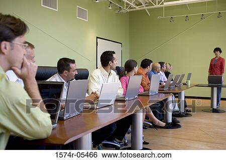 Group of business executives in a conference View Large Photo Image Stock Photograph - Group of business executives in a conference. Fotosearch
