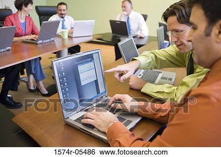 Group of business executives in a conference View Large Photo Image Stock Photograph - Group of business executives in a conference. Fotosearch