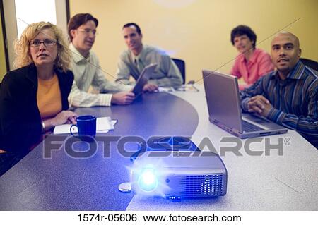 Stock Photograph - Group of business executives in a conference. Fotosearch