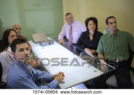 High angle view of a group of business executives in a conference View Large Photo Image Picture - High angle view of a group of business executives in a conference. Fotosearch