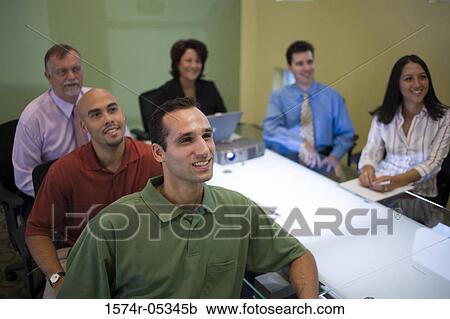 High angle view of a group of business executives in a conference View Large Photo Image Stock Image - High angle view of a group of business executives in a conference. Fotosearch