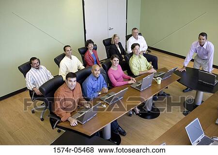 High angle view of a group of business executives in a conference View Large Photo Image Stock Photo - High angle view of a group of business executives in a conference. Fotosearch