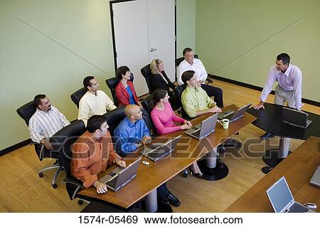High angle view of a group of business executives in a conference View Large Photo Image Stock Photo - High angle view of a group of business executives in a conference. Fotosearch