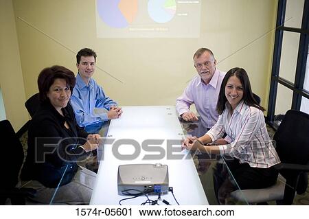 Portrait of a group of business executives in a conference View Large Photo Image Stock Image - Portrait of a group of business executives in a conference. Fotosearch