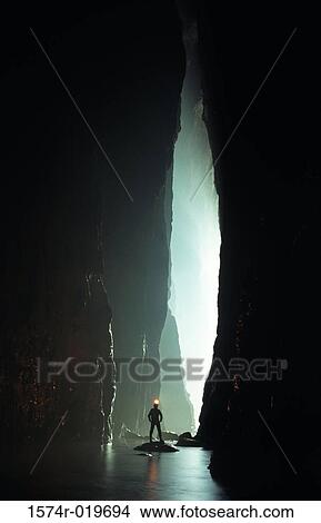 Picture - Caver in River Passage Sichuan Province China. Fotosearch