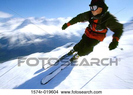Close-up of a young man skiing View Large Photo Image Picture - Close-up of a young man skiing. Fotosearch