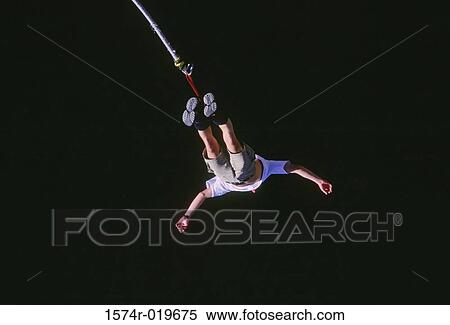 High angle view of a man bungee jumping View Large Photo Image Stock Photography - High angle view of a man bungee jumping. Fotosearch