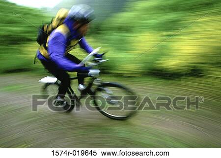 High angle view of a person mountain biking View Large Photo Image Stock Photography - High angle view of a person mountain biking. Fotosearch