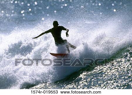 High angle view of a person surfing in the sea View Large Photo Image Stock Image - High angle view of a person surfing in the sea. Fotosearch